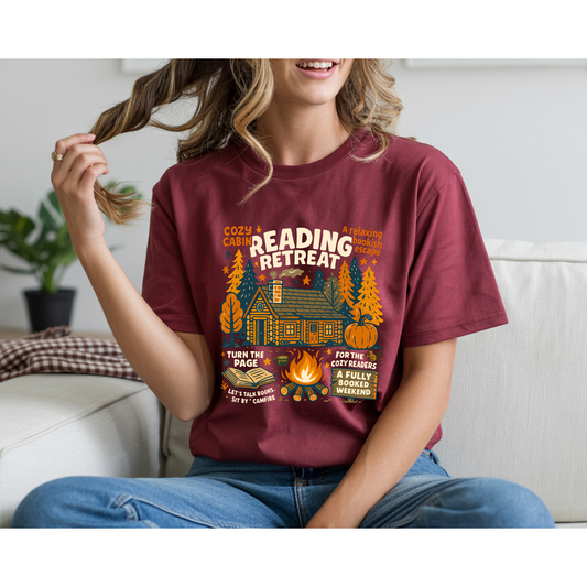 Cozy Reading Retreat T-Shirt - Maroon Color with Forest and Cabin Design for Relaxing Book Lovers